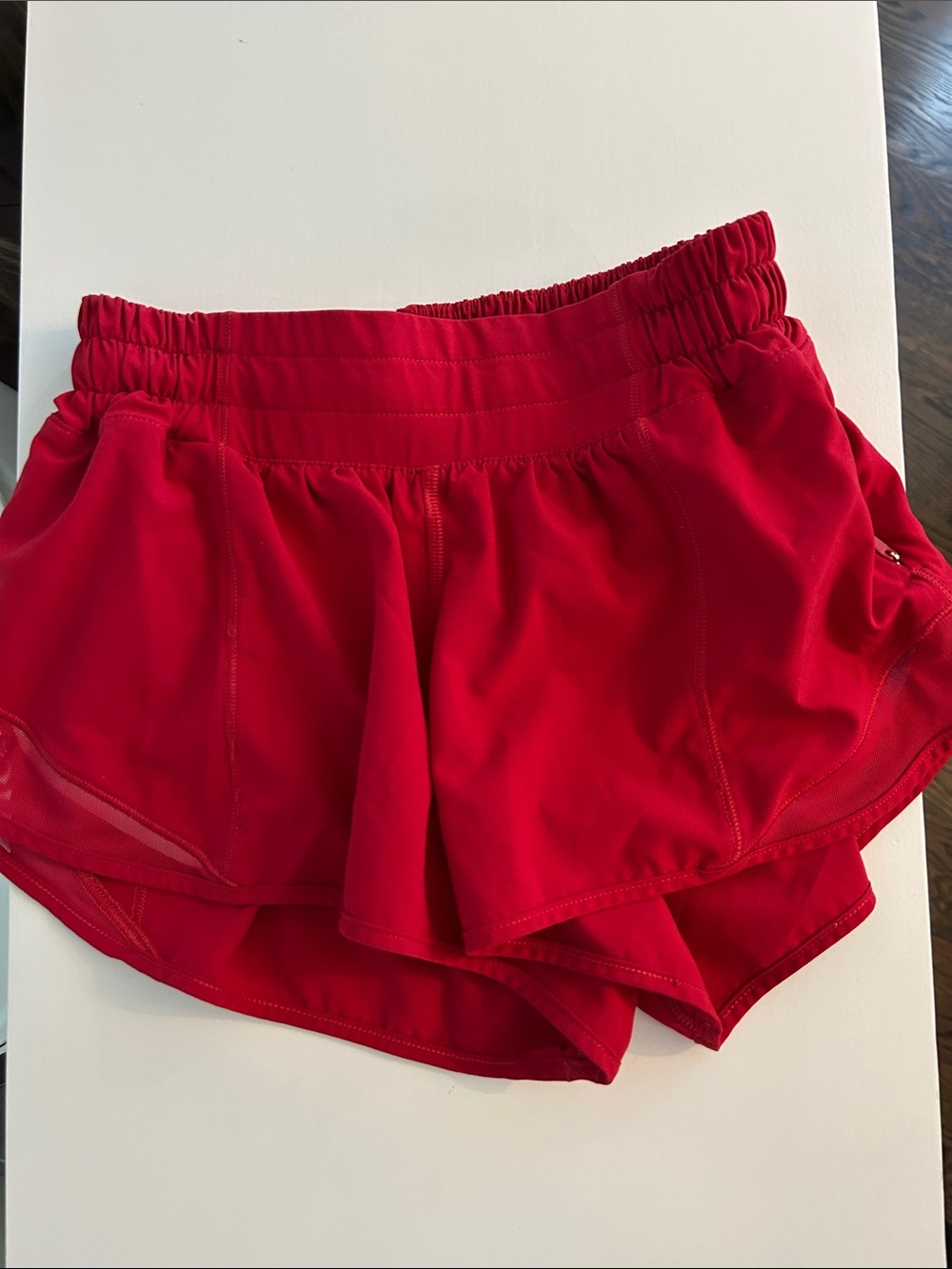 Women’s Lululemon Red Athletic Shorts low rise 2.5 length no stains, light wear